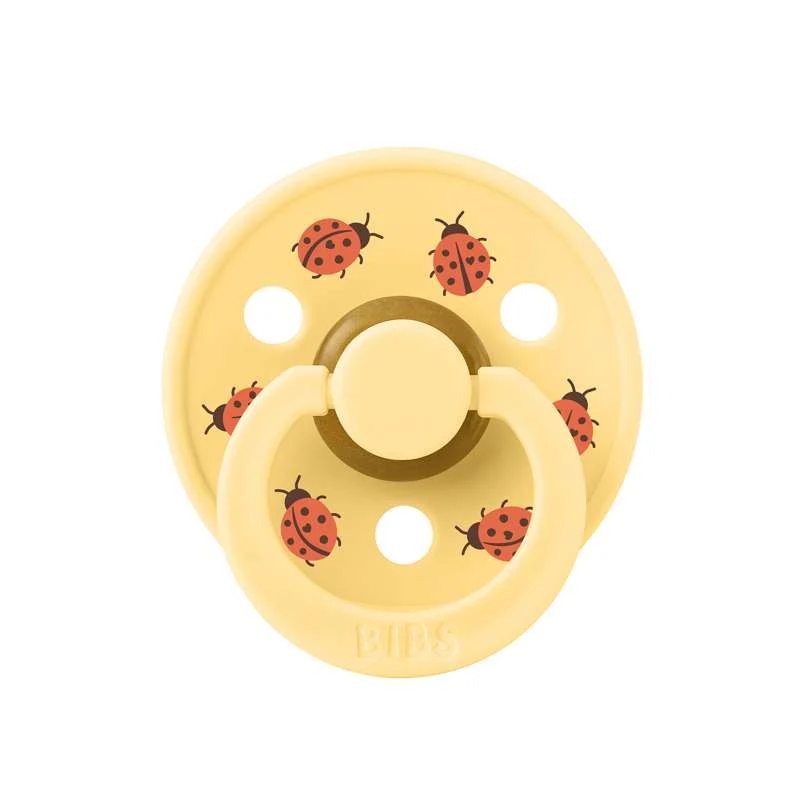 Bibs Okrugla Colour Duda - vel. 2 - prirodni kaučuk - Studio - Ladybug - Svijetla maslaca