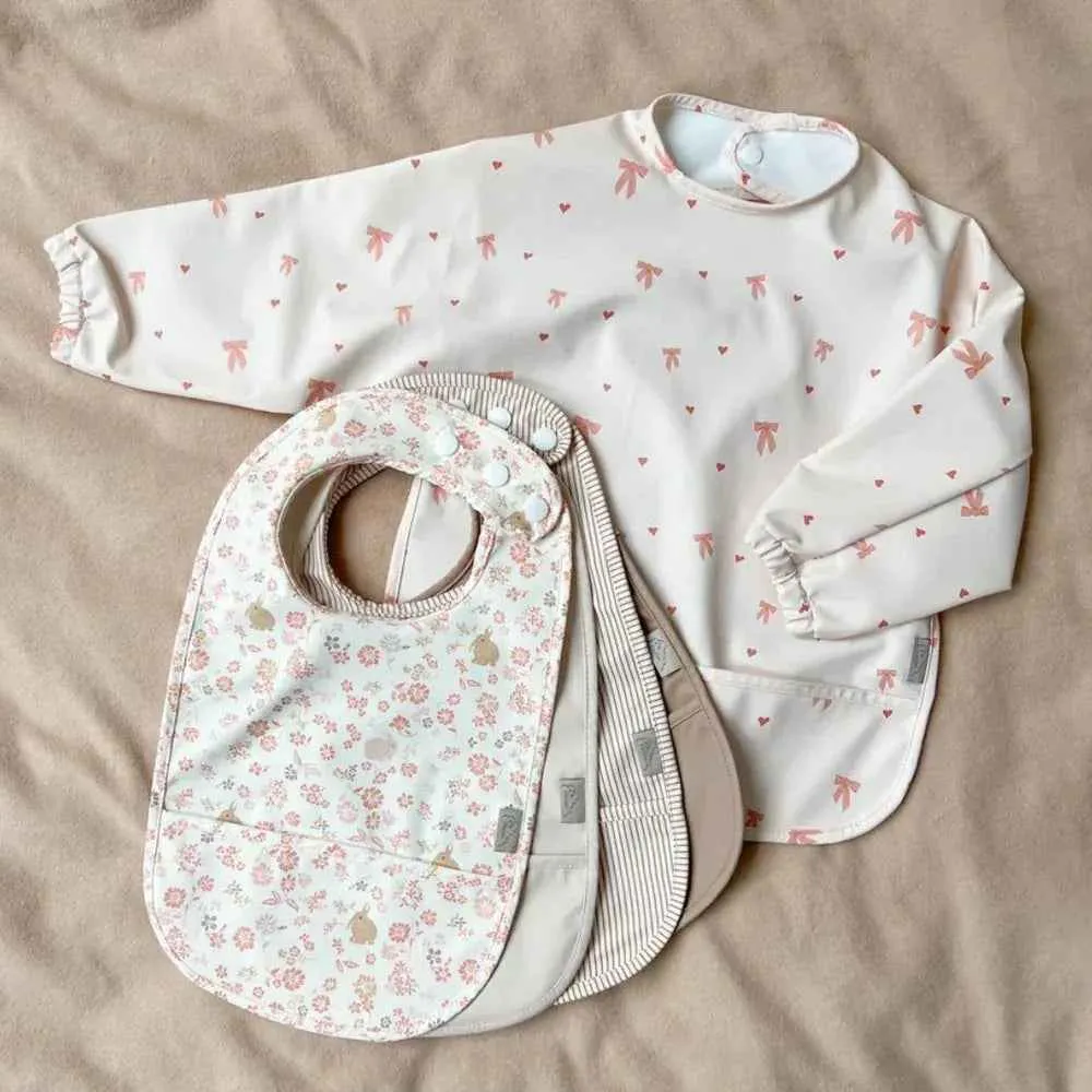 CamCam® Podbradnjak s rukavima Bows