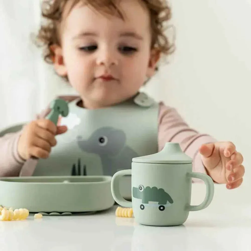 Done Deer® Silikonska šalica s poklopcem i ručkama Playground Green