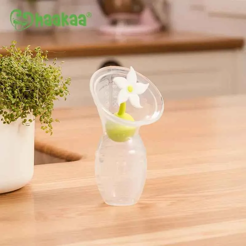 Haakaa® Set silikonska izdajalica 1.gen. 100ml i Poklopac Ružica