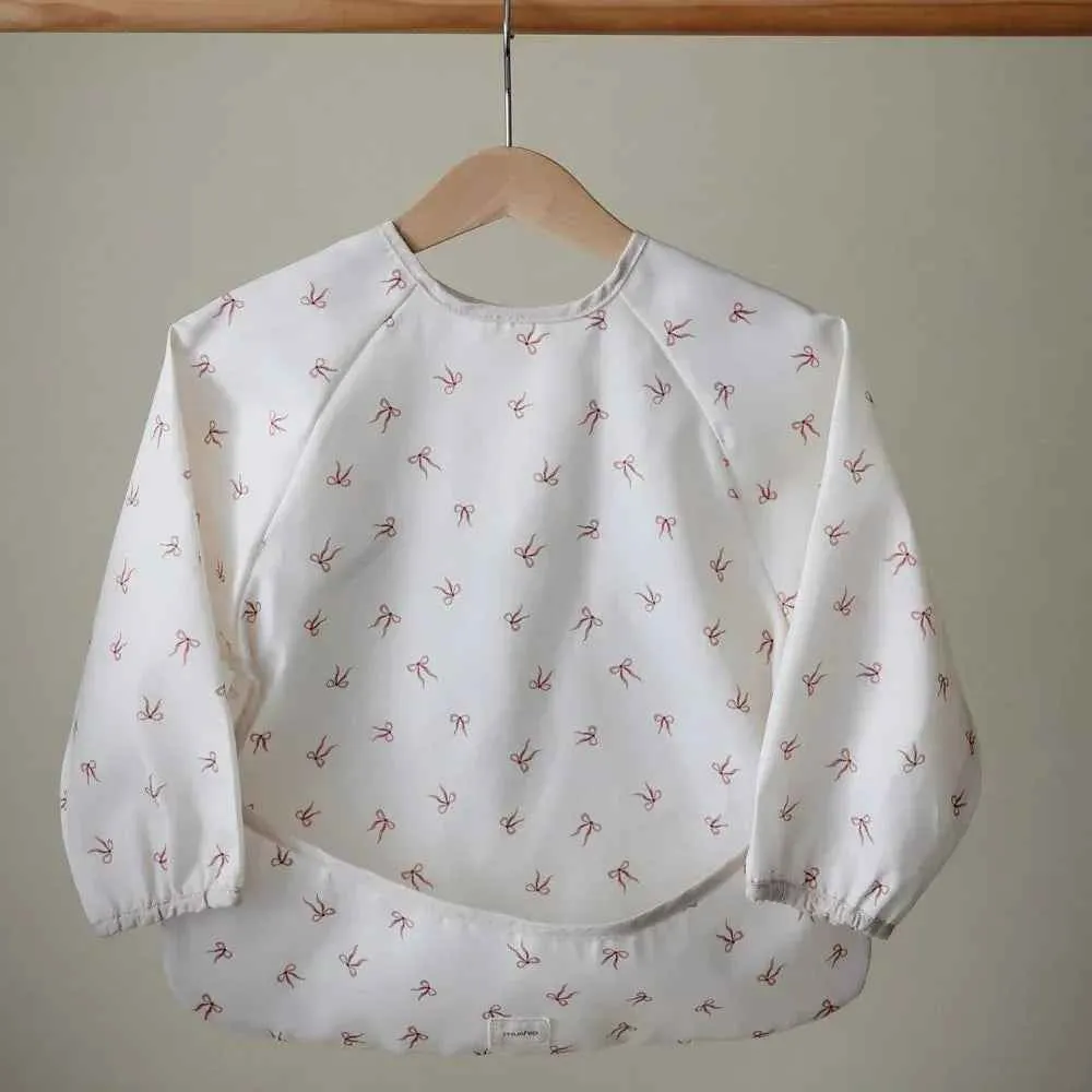 Mushie® Podbradak s rukavima Bows