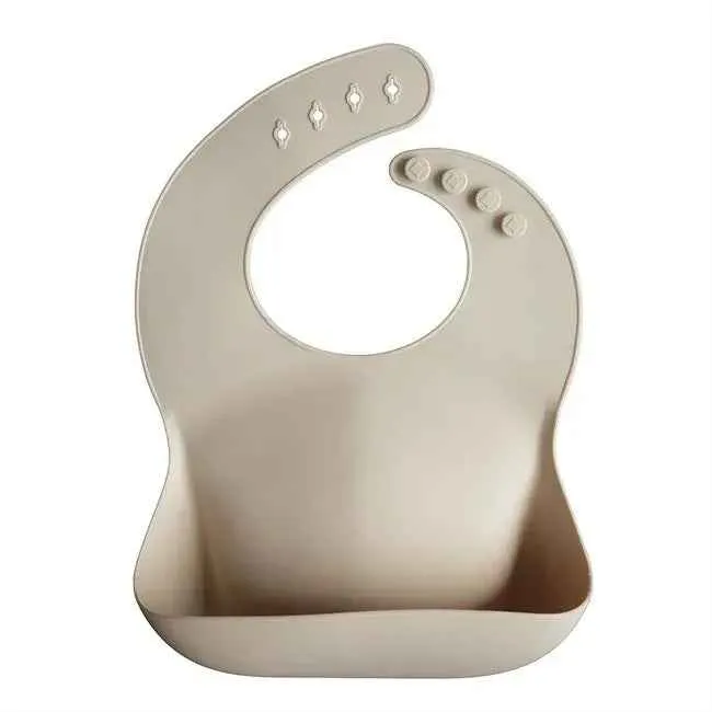 Mushie® Silikonski podbradnjak Shifting Sand