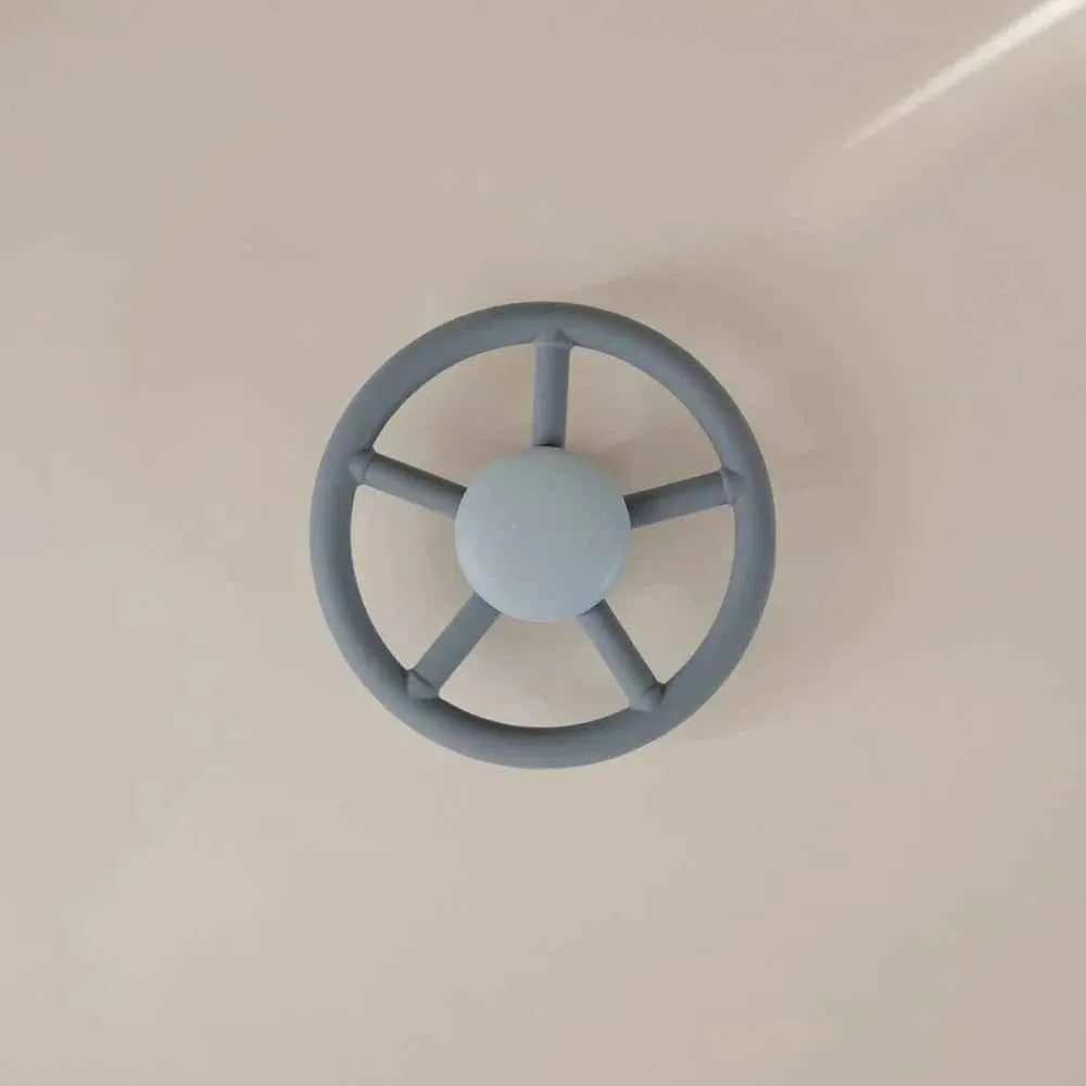 Mushie® Silikonska igračka Spinner Toy Wheel
