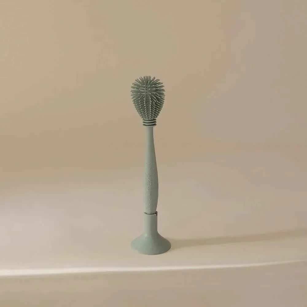 Mushie® Silikonska četka za čišćenje Cambridge Blue