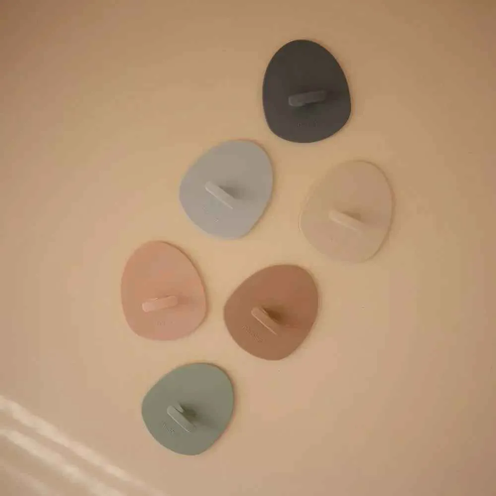 Mushie® Silikonska četka za uklanjanje tjemenice 2 kom Blush/Shifting Sand